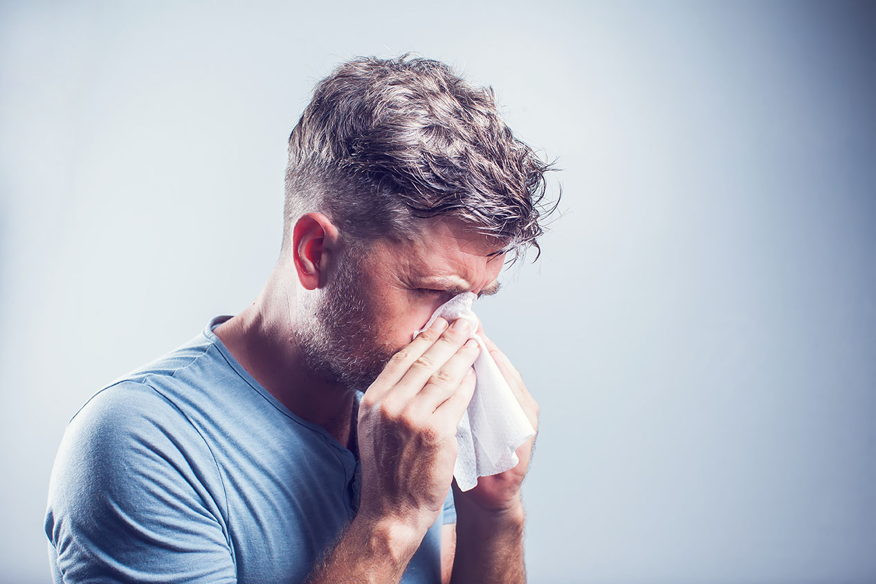 corona virus symptoms sneezing
